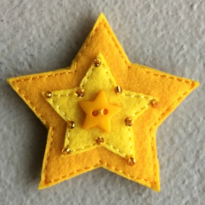 Wee two toned felt star to place on the Christmas tree