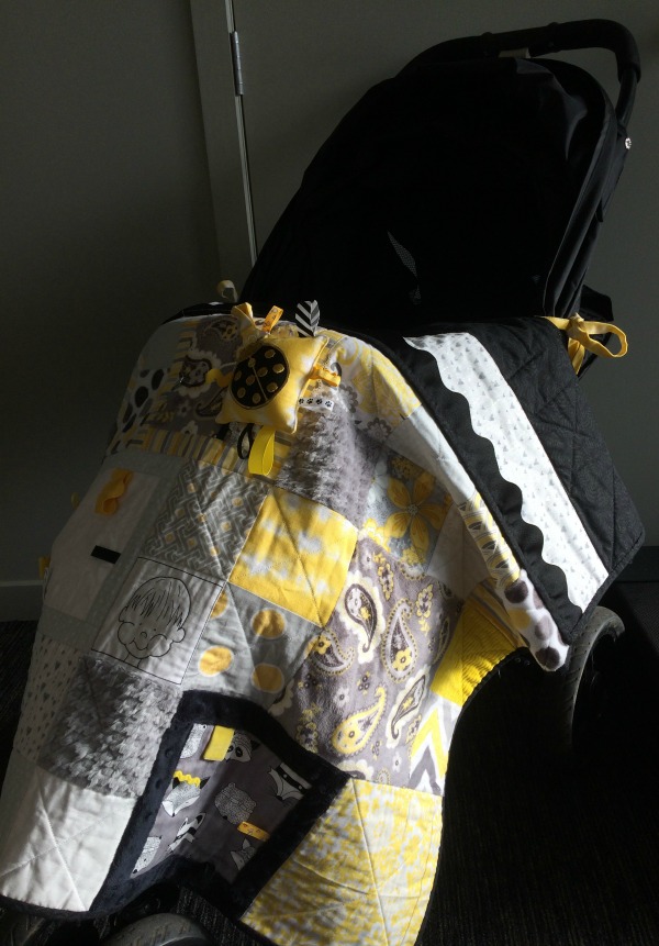 Taggie Blanket as a pram cover