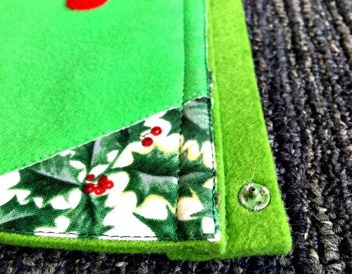 Conical felt tree - felt tab sewn on